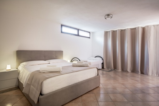 Villa Ornella — Ambiente con letto matrimoniale